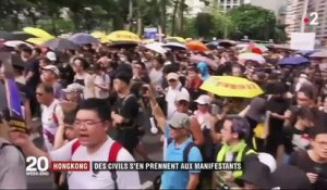 Hong Kong : des civils s'en prennent aux manifestants