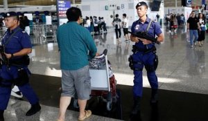 Hong Kong : retour au calme à l'aéroport, Pékin dénonce des agressions "quasi-terroristes"