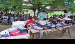 RTG/Remise de kits scolaires aux enfants des personnes handicapées vivant au quartier Pk12 par le Rotary Club Libreville Komo