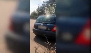 (Attention images violentes) - Un automobiliste fonce et renverse sur une famille qui l'avait surpris en train de photographier leur enfants en cachette
