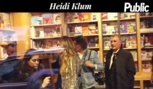 Vidéo : Heidi Klum : Elle sort une robe en or pour une dédicace sexy !