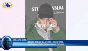 Marina Foïs en maxi look : casquette,  doudoune et une touche Louis Vuitton