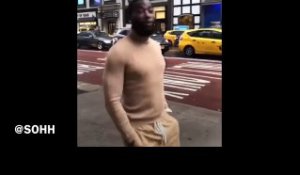 Gucci Mane Walks In The Rain Through The Streets Of New York City