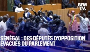 Report de l'élection présidentielle au Sénégal: les images des députés évacués lors du vote