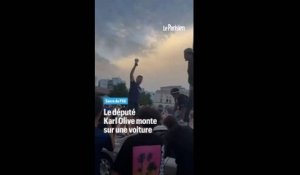Sacre du PSG : le député Karl Olive debout sur une voiture