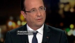 Hollande n'exclut pas une intervention militaire sous...