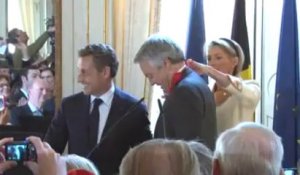 Didier Reynders reçoit les insignes de la Légion d'honneur des mains de Nicolas Sarkozy