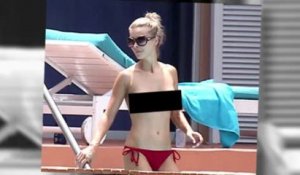 SNTv - Joanna Krupa sans le haut à la piscine
