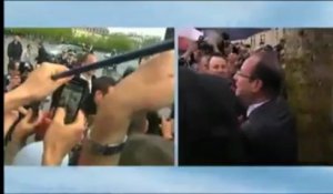 Champs-Elysées. Bain de foule sous la pluie pour François Hollande