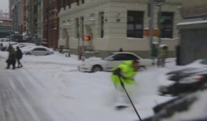 Faire du snowboard à New york, tiré par une voiture!