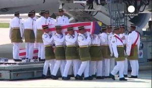 Des dépouilles de victimes du crash du MH17 rapatriées en Malaisie
