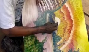 Artiste talentueux peint avec ses doigts