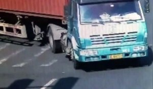 Lucky Cyclist after being run over by  truck
