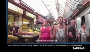 Un couple gay marche main dans la main à Jérusalem sous les insultes des passants