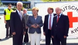 Merkel se fait huer par des militants d'extrême droite lors d'une visite de réfugiés