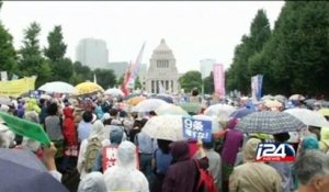 Tens of thousands protest in Japan against security policy