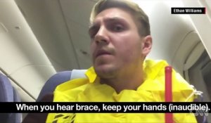 Cet homme filme ce qu'il se passe à l'interieur d'un avion pendant un atterrissage d'urgence