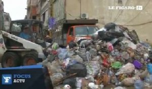 Inondations au Liban: les rues transformées en rivières d'ordures