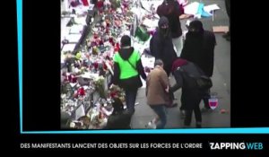 COP21 : Des manifestants jettent des bougies déposées pour les victimes des attentats de Paris sur les policiers (vidéo)