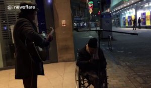 Homeless man joins busker in amazing spontaneous street jam