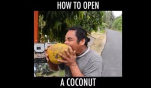 Voilà comment les vrais hommes ouvrent une noix de coco! Avec les dents