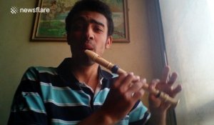 Man beatboxes Mozart's Symphony No. 40 while playing the recorder