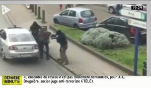 Attentats de Paris: Vidéo de l'arrestation d'un homme en pleine rue en Belgique
