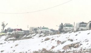 Sous la neige, évacuation des derniers rebelles d'Alep
