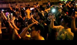 Occupy Hong Kong (Day 4): Jeers at China flag-raising ceremony and a sea of lights in Admiralty