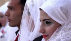 30 couples celebrate simultaneous wedding in Aleppo