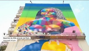 Un street-artist peint une Joconde géante sur une tour à Paris