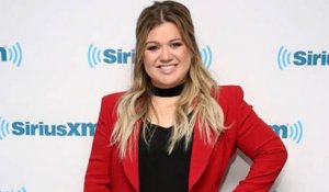 Kelly Clarkson Explains Why She is Judging 'The Voice' Instead of 'American Idol' | Billboard News