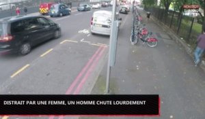Distrait par une femme, un homme chute lourdement en pleine rue (vidéo)