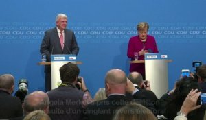 Merkel prépare sa sortie après un cinglant revers électoral