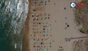 Coronavirus: à Valence, en Espagne, une plage divisée en parcelles pour assurer la distanciation sociale