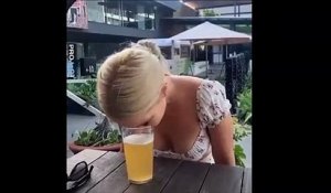 Elle boit une biere sans les mains... la femme parfaite
