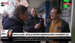 Face à la rue - Accrochage entre Nicolas Dupont-Aignan et un pharmacien de Bobigny sur la vaccination: "Pour établir la confiance des gens, il faut avoir de l’honnêteté intellectuelle" - VIDEO