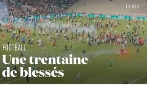 Saint-Etienne :  la pelouse de Geoffroy-Guichard envahie par les supporters de l'ASSE