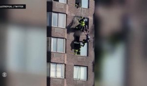 USA : Les images spectaculaires des pompiers risquant leur vie cette nuit lors d'un incendie qui a fait au moins 38 blessées à New York