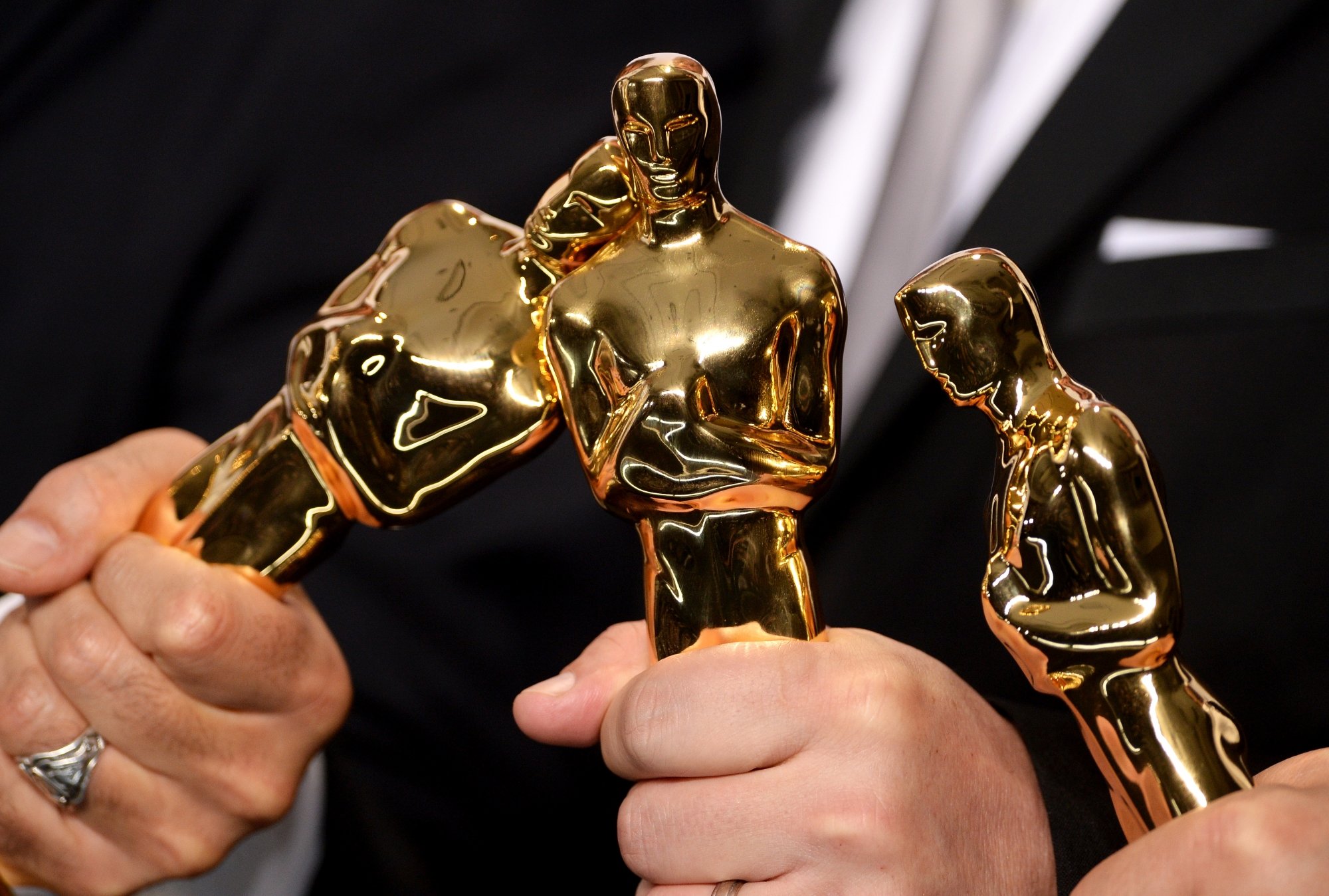 Trio de statuettes durant la 87e cérémonie des Oscars à Los Angeles, le 22 février 2015.