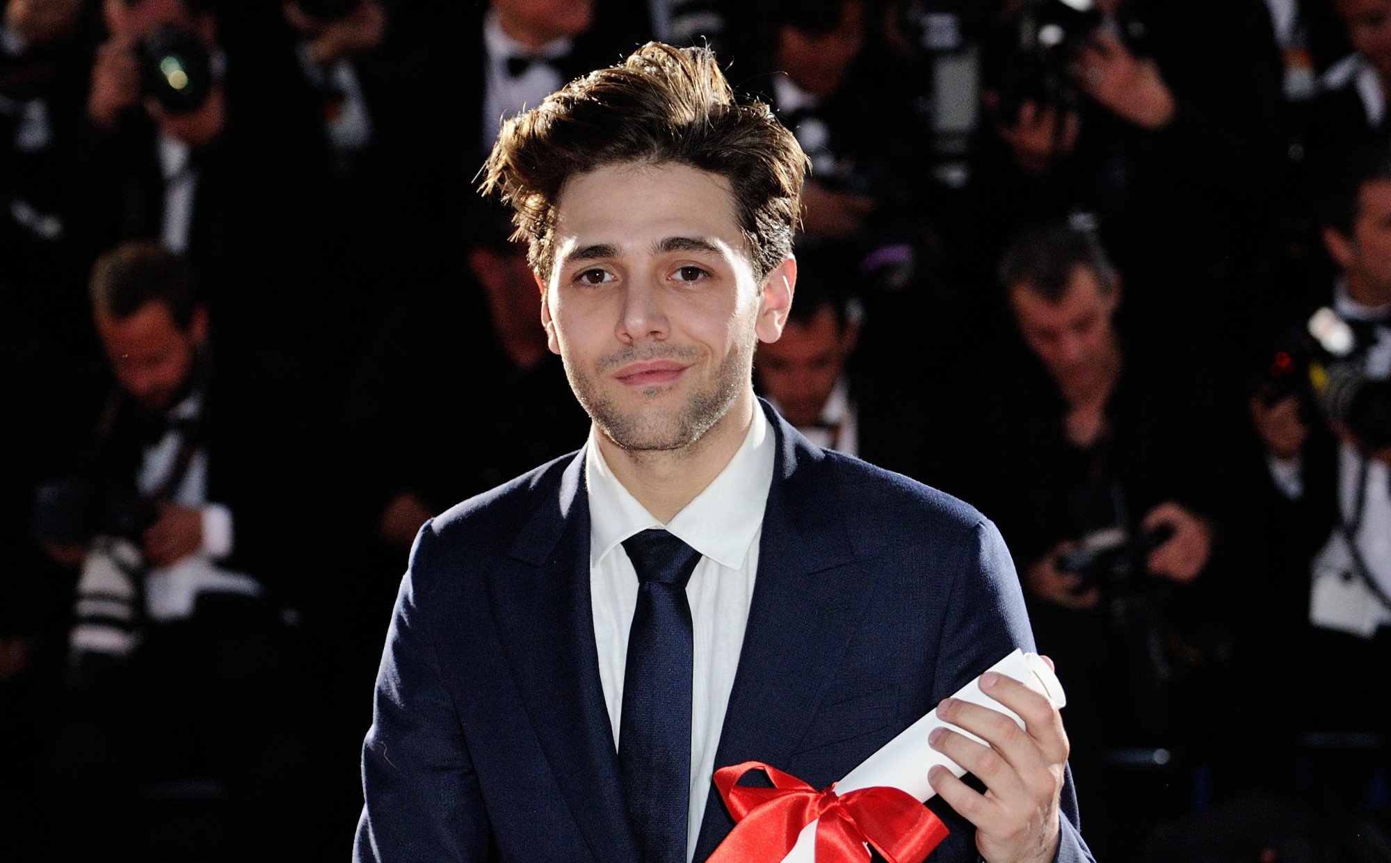 Xavier Dolan après avoir reçu son Grand Prix du Festival de Cannes 2016.