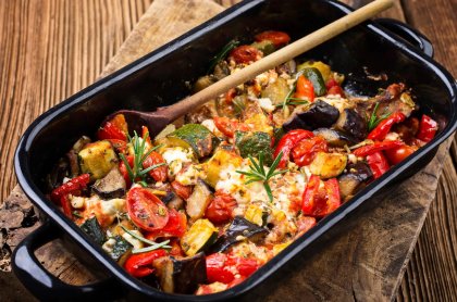 Sliced roasted vegetables and rosemary