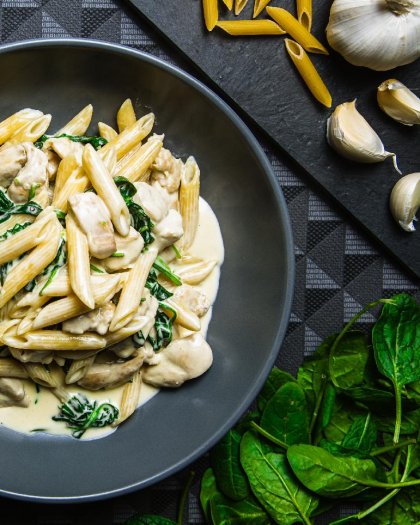 Sauteed chicken with penne and baby spinach