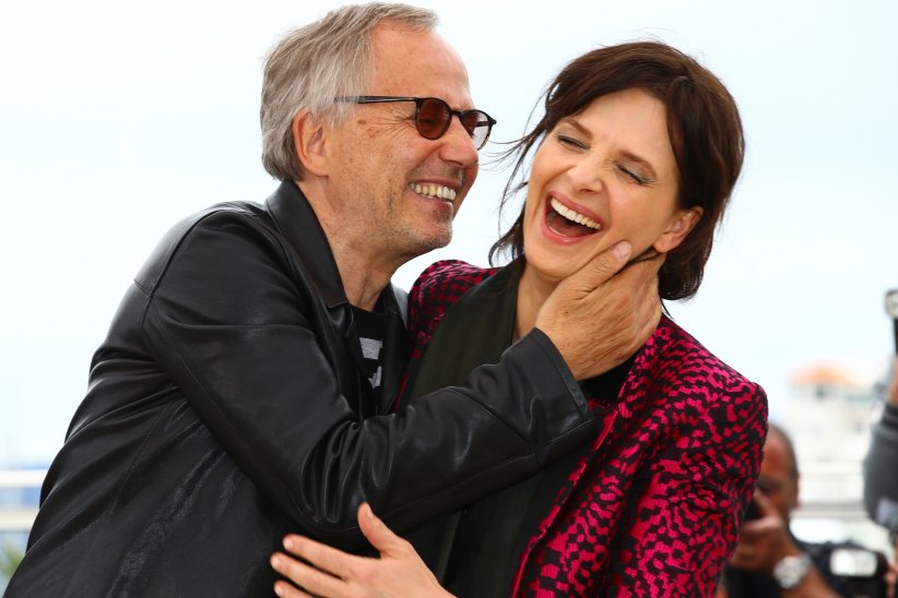 Fabrice Luchini et Juliette Binoche pendant le photocall de Ma Loute, lors du 69ème Festival de Cannes, le 13 mai 2016.