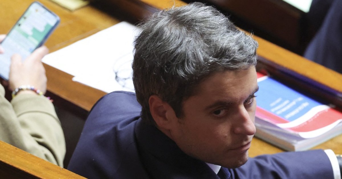 Gabriel Attal lors d'un déplacement de campagne, juin 2026 — AFP / Julien de Rosa